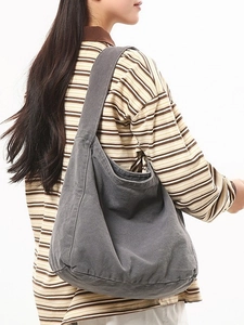 Large gray washed canvas hobo crossbody bag for women showing spacious casual design