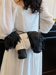 Creative sheepdog crossbody bag featuring black fringe tassels and a quilted design