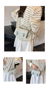 Détail du sac messager bleu clair vert menthe avec matelassage nœud et boucles rétro