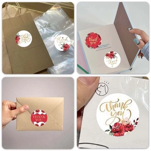 Floral Thank You stickers applied on kraft paper bags and gift envelopes for packaging