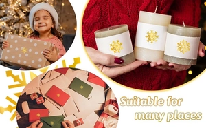 Detail showing gold foil snowflake stickers on gift boxes and holiday candle packaging