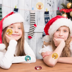 500 Merry Christmas round stickers with snowman and Santa patterns for gift decor