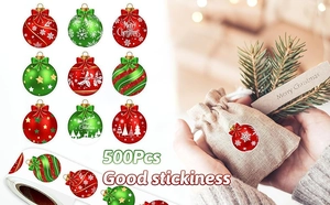 Détail du rouleau de 500 autocollants de Noël avec motifs de cerf et de flocon de neige