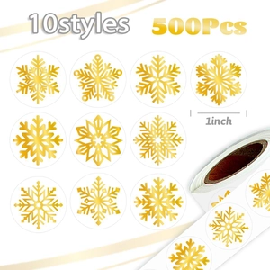 Roll of 500 gold foil snowflake stickers with 10 winter designs for holiday envelopes