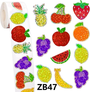 Macro shot of assorted laser holographic fruit stickers with glitter finish details