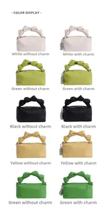 Cloud handbag color display in white, green, black, yellow with knotted handle detail