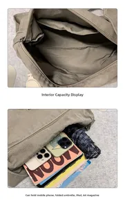 Internal view of a washed canvas messenger bag showing large capacity for iPad and A4 items