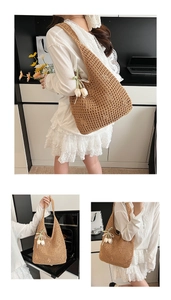 Close-up of woven cotton rope tote bag with tulip pendant and pearl chain detail