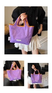 Purple canvas tote bag with orange trim, minimalist casual handbag, stylish portable shopping bag.