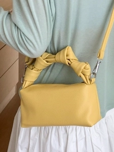 Retro ginger yellow knotted cloud handbag with lychee texture and adjustable shoulder strap