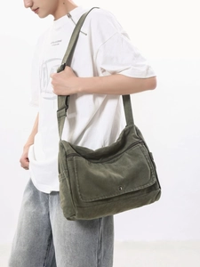 Army green canvas messenger bag with wide adjustable strap and large capacity