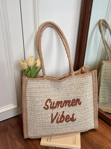 Summer Vibes straw tote bag with brown trim and woven handles for beach and daily commute