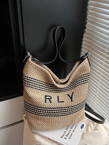 Woven straw bucket bag with black stripes and RLY embroidery for summer beach vacation