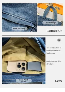 Detail of reinforced handles, inner pockets, and sewing on dark blue denim tote bag
