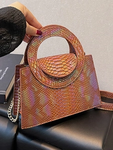 Iridescent crocodile pattern handbag with circular handle and chain strap in bronze
