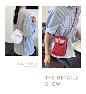 Close-up showing white and burgundy leather crossbody bags with elegant metal details