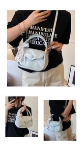 Detail of light green marble texture handbag with elegant white lace bow on the handle