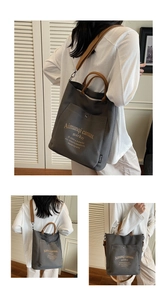 Close-up of durable canvas tote with adjustable strap and large front pocket detail