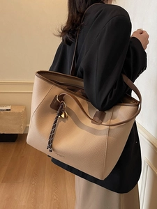 Chic beige lychee leather tote bag with dark brown straps for professional office women