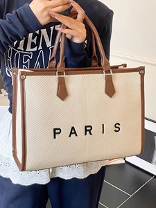 Grande borsa tote in tela beige con finiture in pelle marrone e ricamo Paris nero
