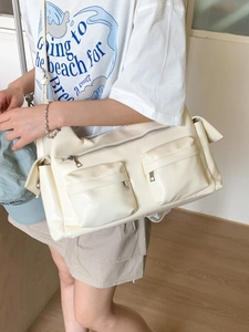 Chic cream white multi-pocket utility tote bag with adjustable shoulder strap and smooth PU leather