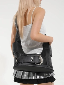 Retro black Y2K punk style large hobo bag with metal rings shown on female model