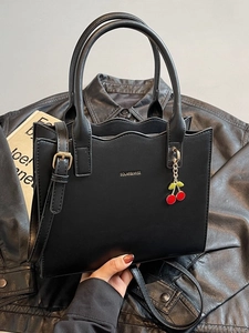 Large capacity black tote bag with wave-edge top and cherry charm decoration