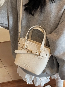 Retro cream white textured leather handbag for women featuring a minimalist tote design