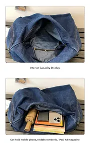 Detail view of large washed denim tote interior showing massive capacity for daily essentials