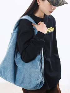 Light blue large capacity denim hobo bag featuring retro washed texture and shoulder strap