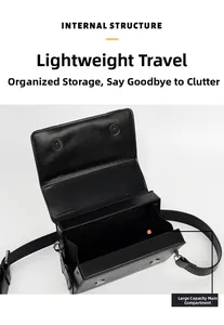 Detailed internal structure view of the black leather box bag with large main compartment