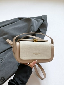 Elegant contrast color box bag with woven texture and leather panels for women
