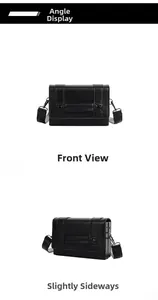 Detail view of black crossbody box bag with studs and adjustable wide strap