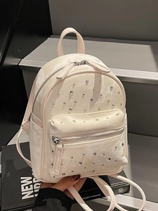 Chic beige mini quilted backpack with sparkling rhinestones and adjustable straps