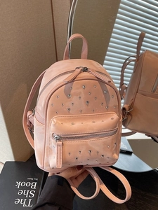 Pink patent leather mini backpack with diamond quilting and sparkly rhinestone accents