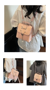 Pink patent leather mini backpack with metal butterfly charm and multi-way straps