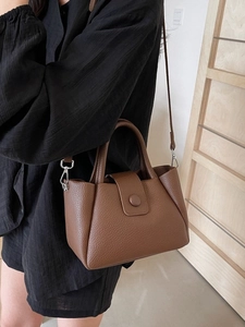 Brown lychee pattern tote bag for women with dual handles and crossbody strap