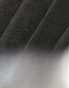 Detailed texture of soft breathable vintage washed cotton fabric on t-shirt
