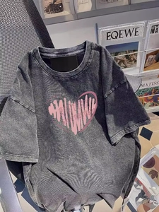 Washed grey oversized t-shirt with pink heart graphic and crew neck design
