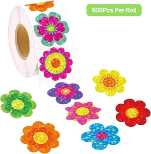 Close-up of 500 holographic flower stickers on a roll with sparkling laser textures