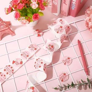Roll of pink strawberry Thank You stickers for gift wrapping and decorative sealing