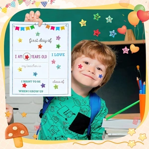 Laser smiley star stickers set with First Day of School board held by a smiling boy