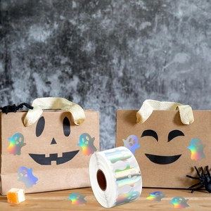 Holographic ghost stickers on brown gift bag for Halloween party decoration