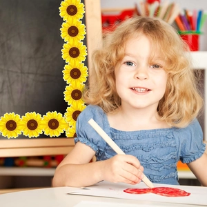Sunflower chalkboard border stickers used for classroom decoration in bright yellow colors