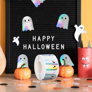 Macro shot of laser ghost stickers for Halloween decorations and gift sealing