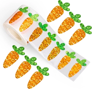 Macro detail of glittery carrot sticker roll for Easter gift wrapping and scrapbooking