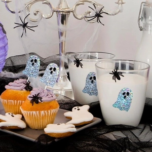 Close-up of holographic ghost stickers with glitter finish for Halloween party decor