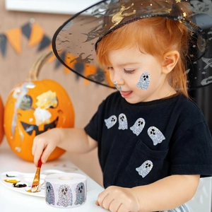 Ghost Halloween holographic stickers used for decorating festive pumpkins on roll
