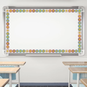 Sunflower smiley border stickers used for decorating a whiteboard in a classroom setting