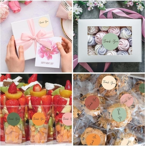 Detailed application of colorful Thank You labels on gift boxes and dessert packaging